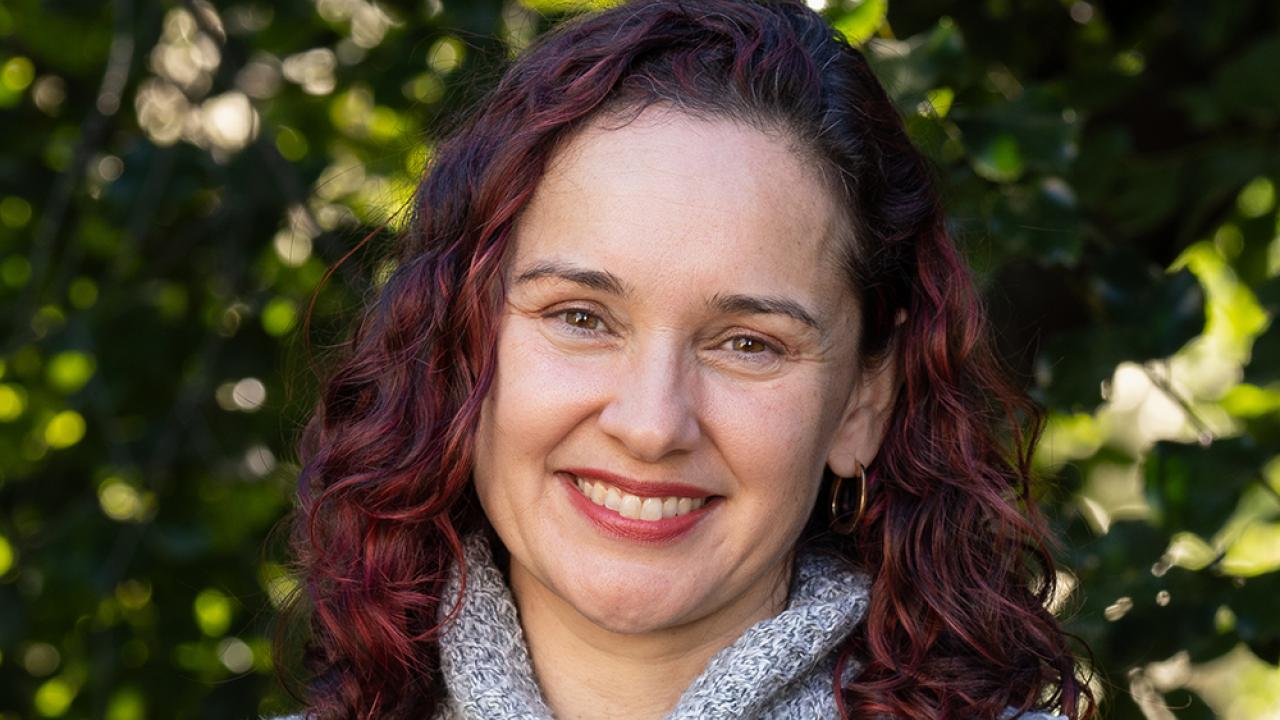 A person smiling for a picture.
