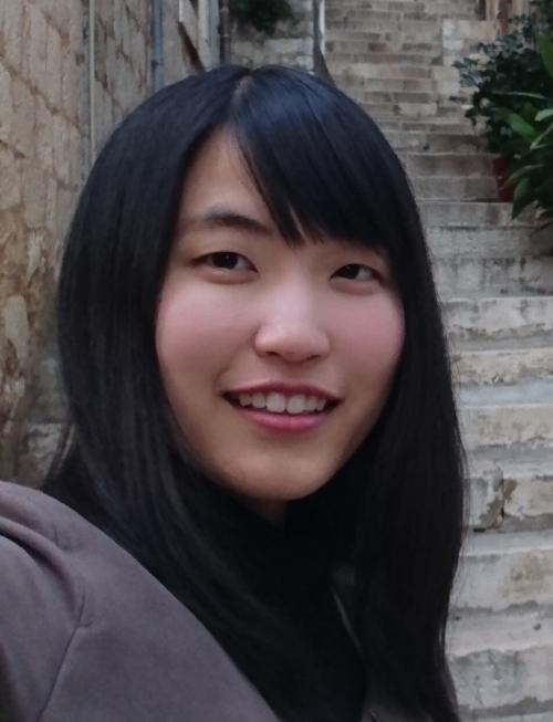 A person smiling for a picture.