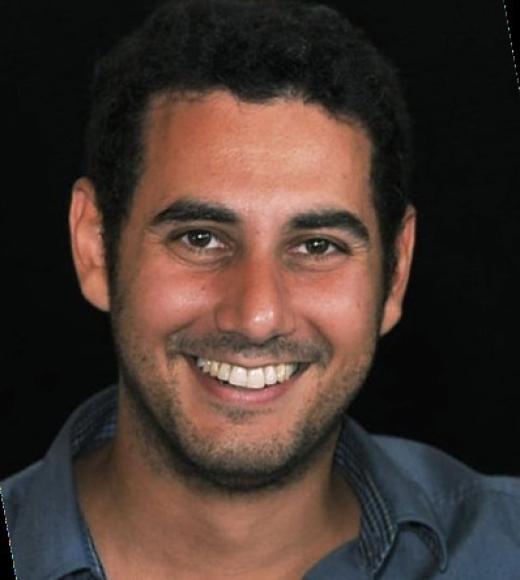 A person smiling for a picture.