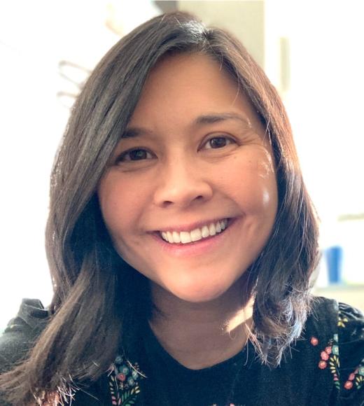 A person smiling for a picture.