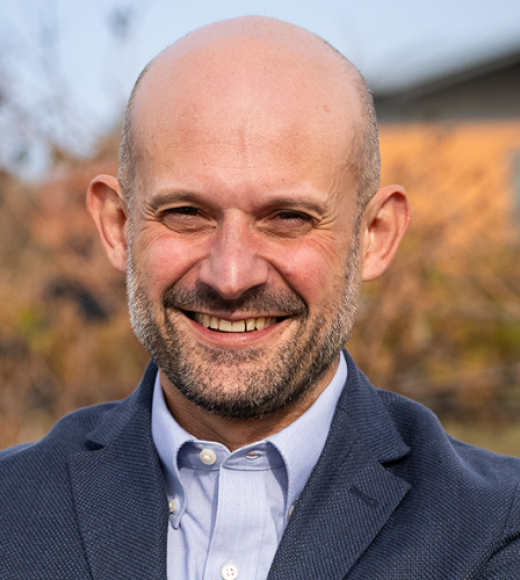 A person smiling for a picture. Picture of Prof. Dario Cantù