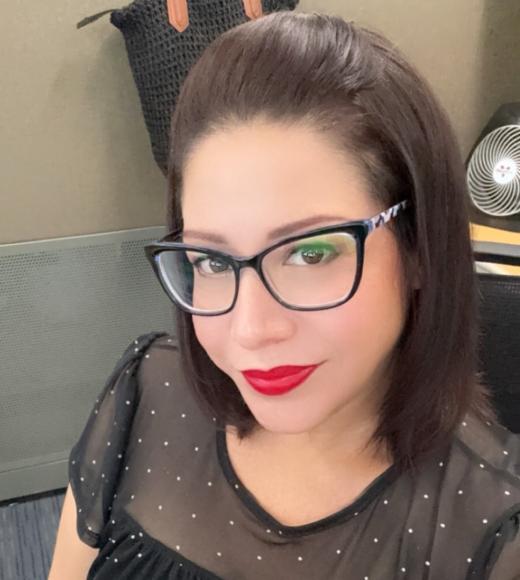 A person smiling for a picture.